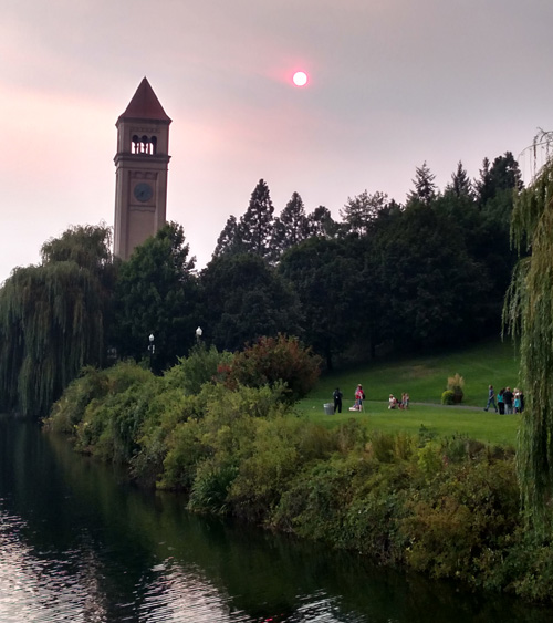 The convention center is situated beside the Spokane River. We crossed a footbridge from our hotel  to reach it. On Wednesday afternoon, the smoke was thick enough to create a red sun (color not captured by my phone camera).